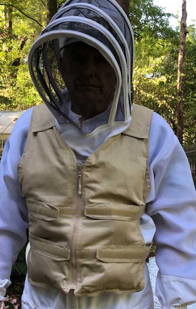 Man in Bee Keeper outfit wearing Kool Max adjustable zipper front cooling vest